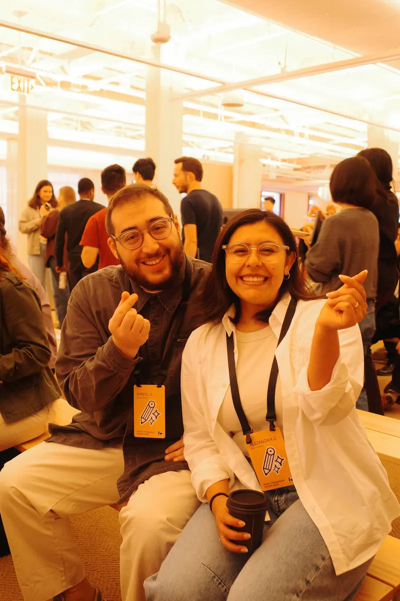 Alejandra and Daniel, cofounders of Noxen Studio, smiling at the Notion Ambassador Summit 2026