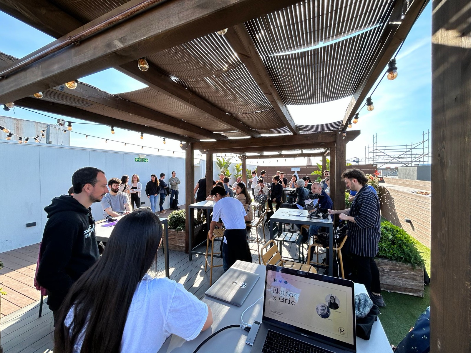 A room of attendees working on laptops during an onsite Notion session