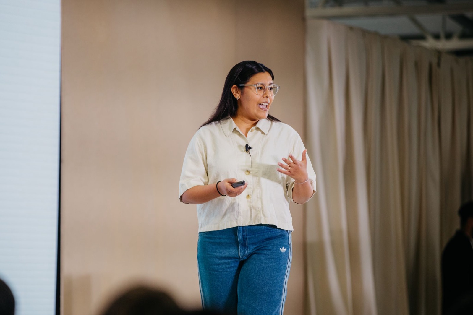 Alejandra Cienfuegos speaking on stage